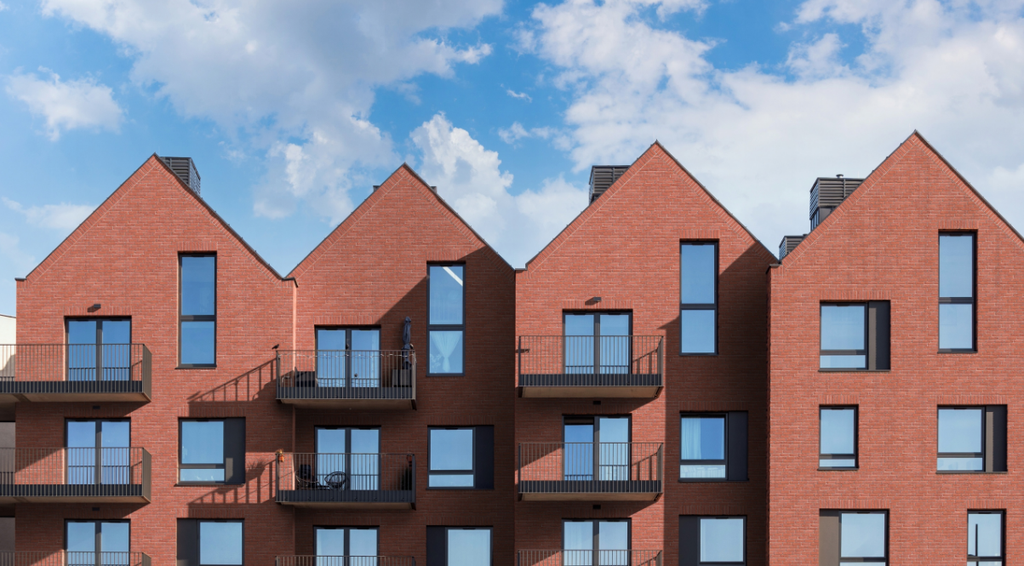 External facade of commercial property with Red Brick Slips cladding 