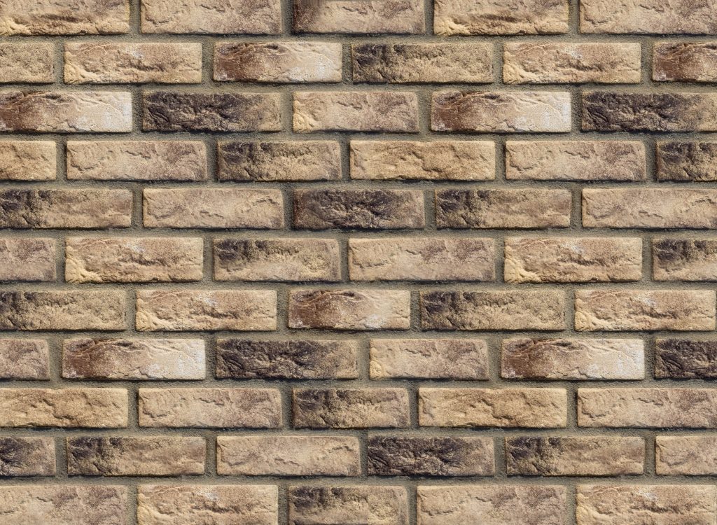 Cambridge Brick Slips close up in Beige weathered