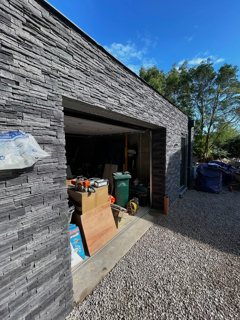 Garden room exterior finished with Cumbrian Slate stone cladding