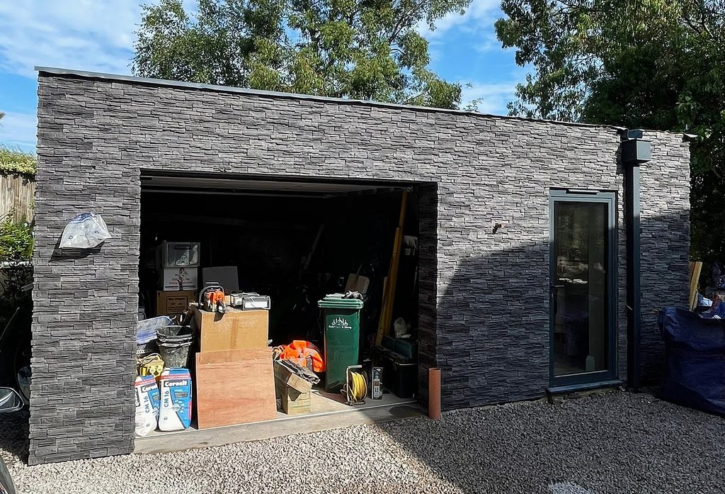 Cumbrian Slate cladding used across buildings at Brighton new build