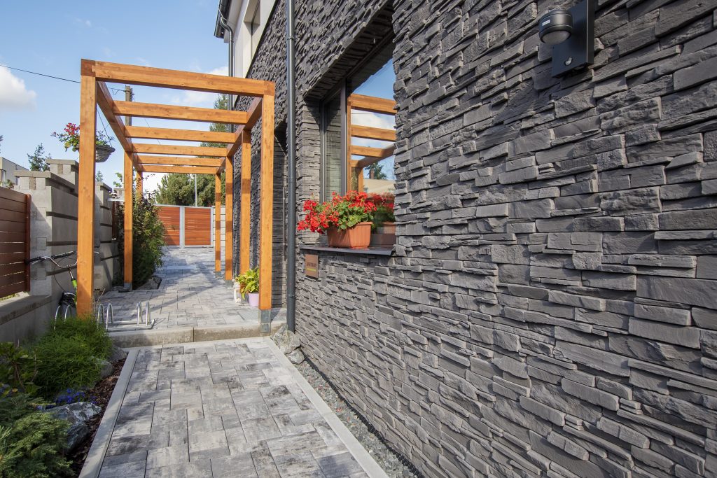 Exterior house with stone cladding professionally installed by Humber Cladding