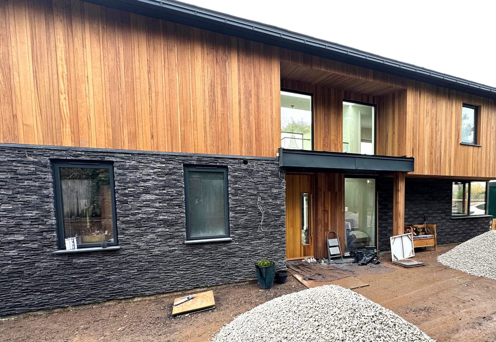 Cumbrian Slate stone cladding on new build house in Brighton