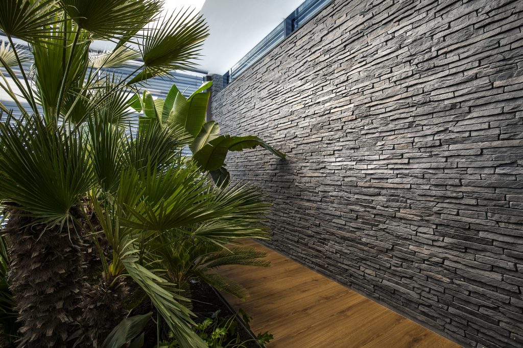Interior feature wall finished with Sierra Graphite stone cladding