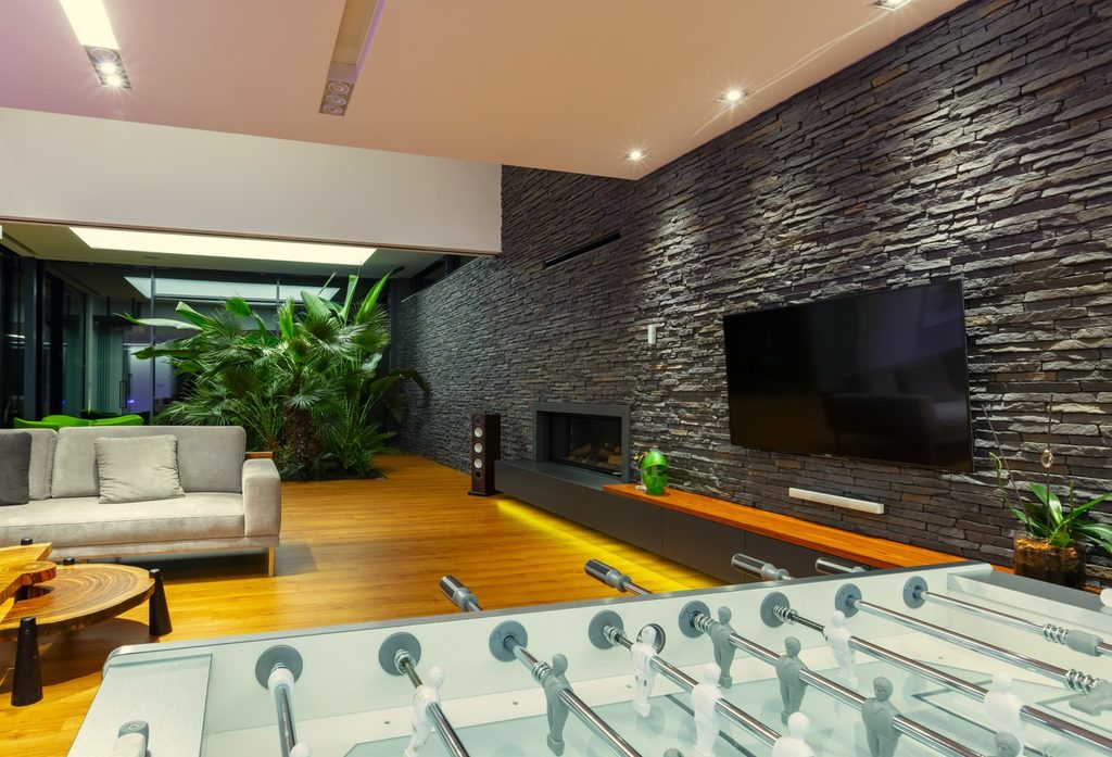 Sierra Graphite stone cladding in open-plan living area of Cheshire home