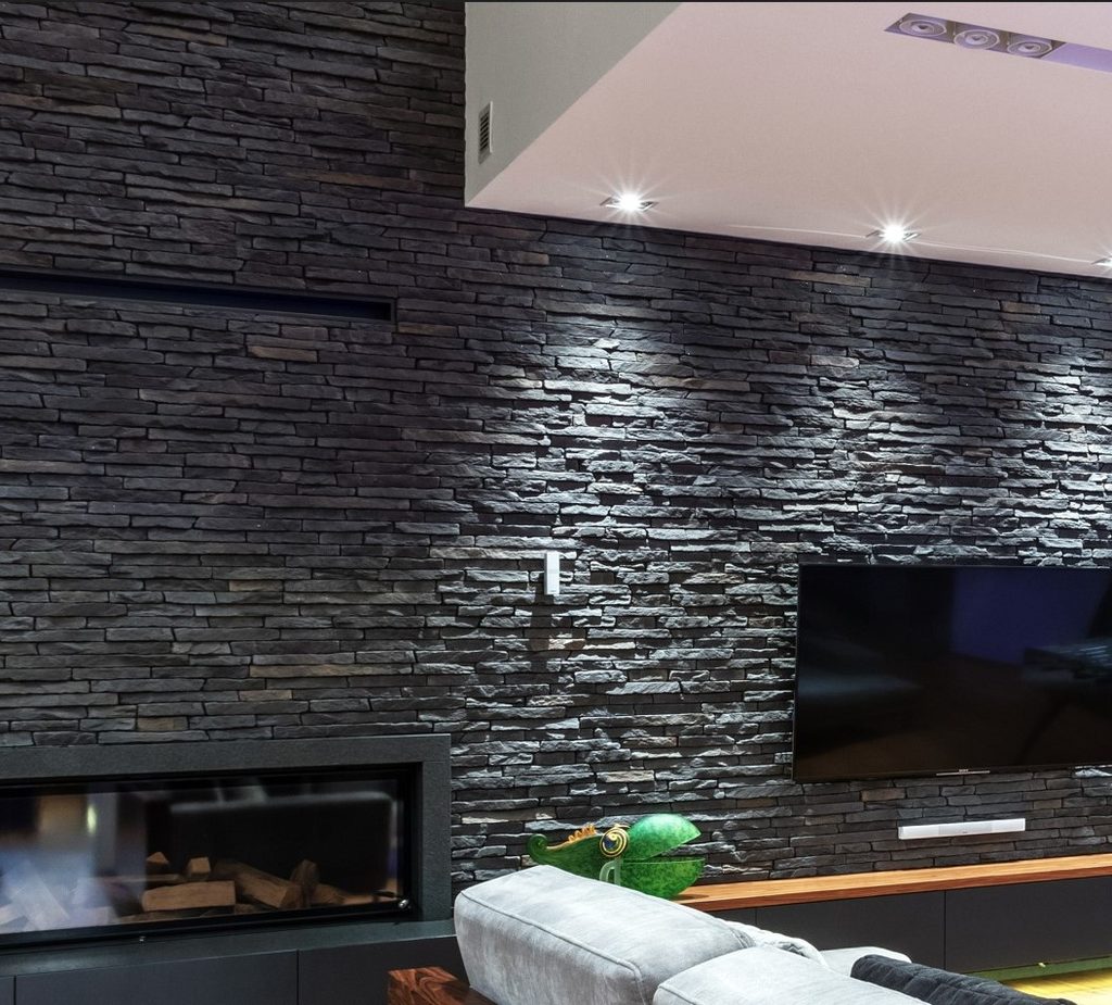 Sierra Graphite stone cladding media wall in Cheshire home