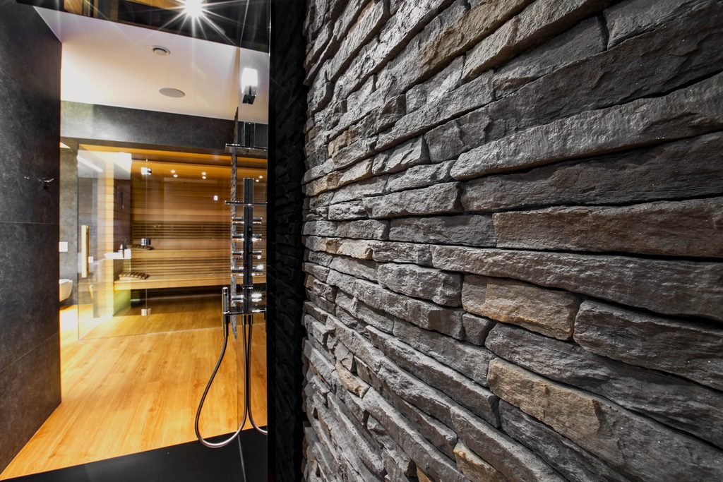 Sierra Graphite stone cladding around indoor swimming pool in Cheshire home