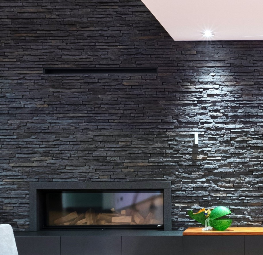 Sierra Graphite interior stone feature wall with television